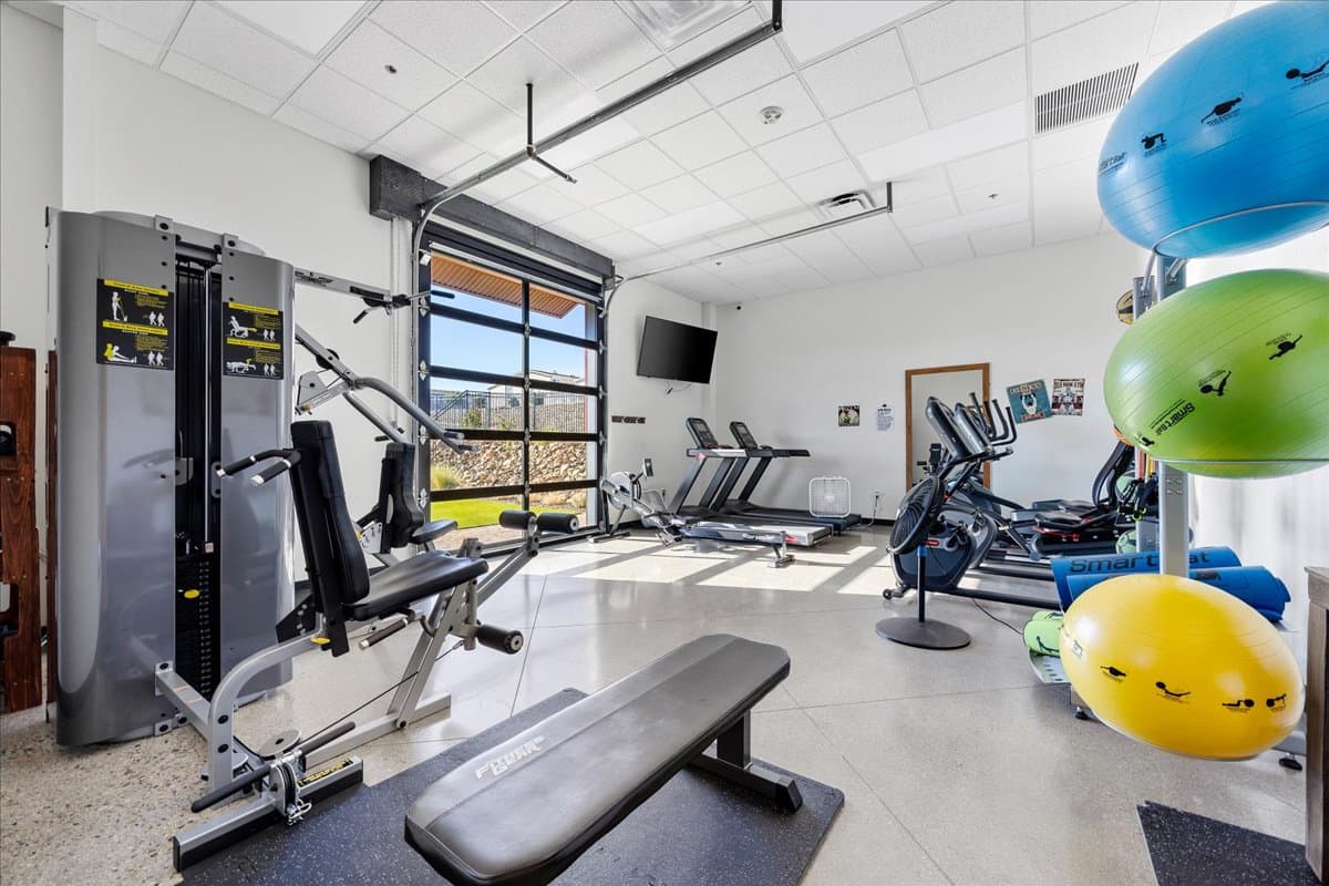 The community fitness room at Orchard Ranch North Resort with cardio and strength equipment.